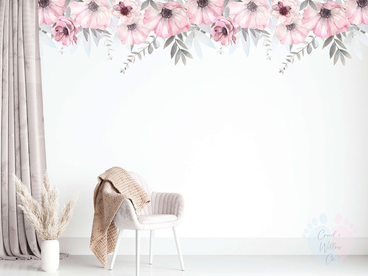 blush floral border wall decal featuring pink roses and leafy vines