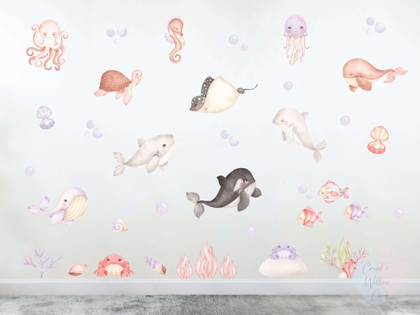 pink ocean animal wall decal with pastel whales jellyfish and coral