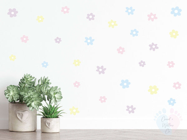 pastel daisy wall decal set in blush lavender yellow and mint tones