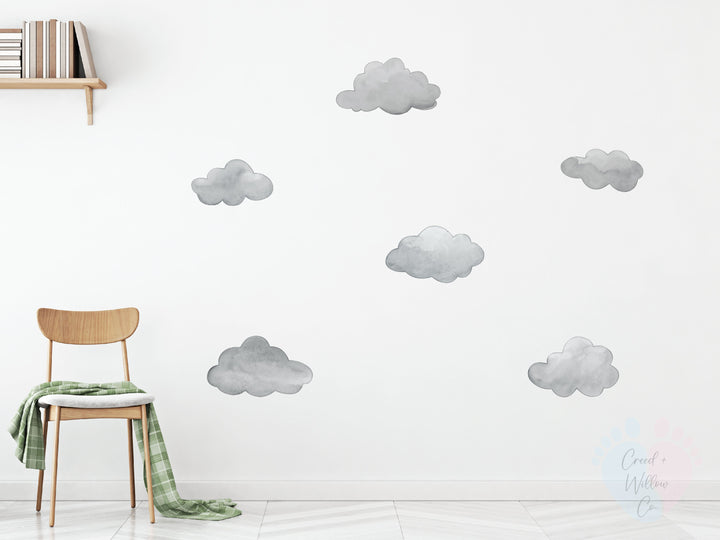 Pack Includes Six Dark Grey Cloud Wall Decals Against a Sky Backdrop