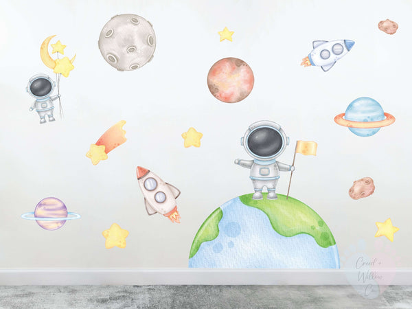 space wall decal set with planets stars and rockets in soft pastel tones