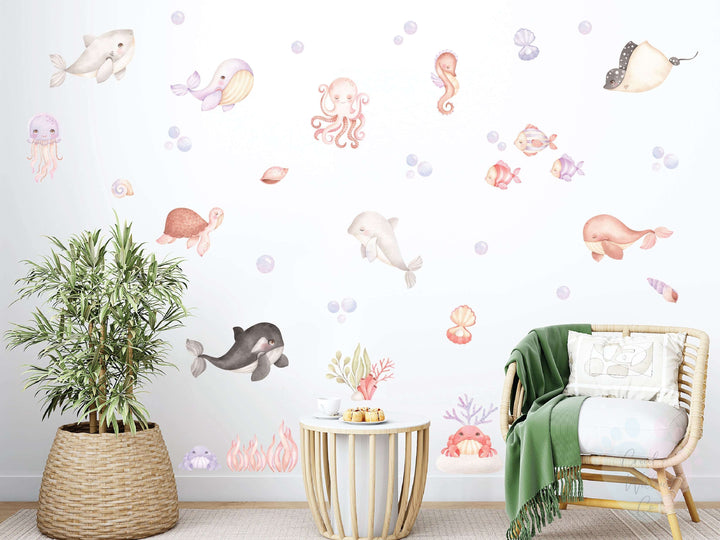 Pink Sea Wall Decals Featuring Diverse Sea Animals On a Wall Mural