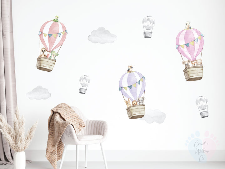 removable nursery wall decal with australian animals floating through clouds