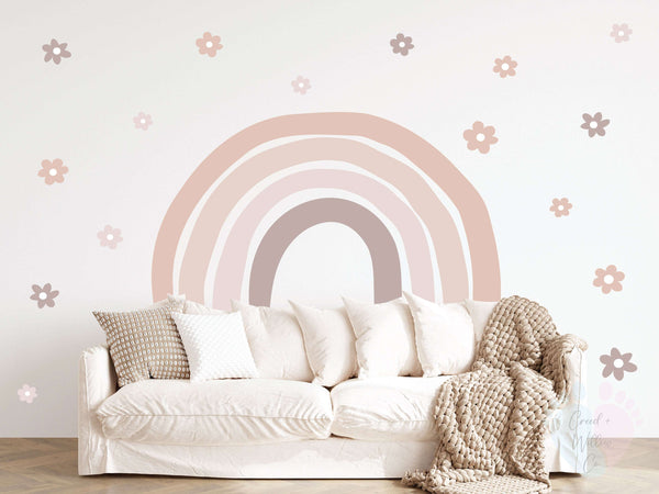 Size Pack Includes Removable Rainbow Wall Stickers On a Pink Wall With Flowers